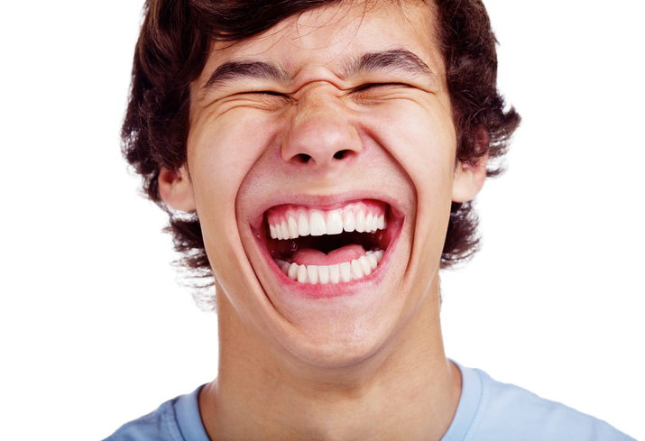 iStock-453958099.ManLaughingSM.jpg