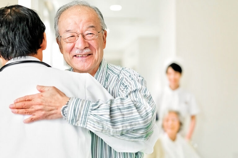 Patient Hugging Doctor