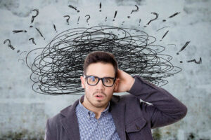 stressed out man unsure what to do next about medical test results