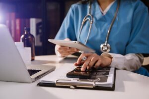 doctor works on research to advance medical treatments through a clinical trial