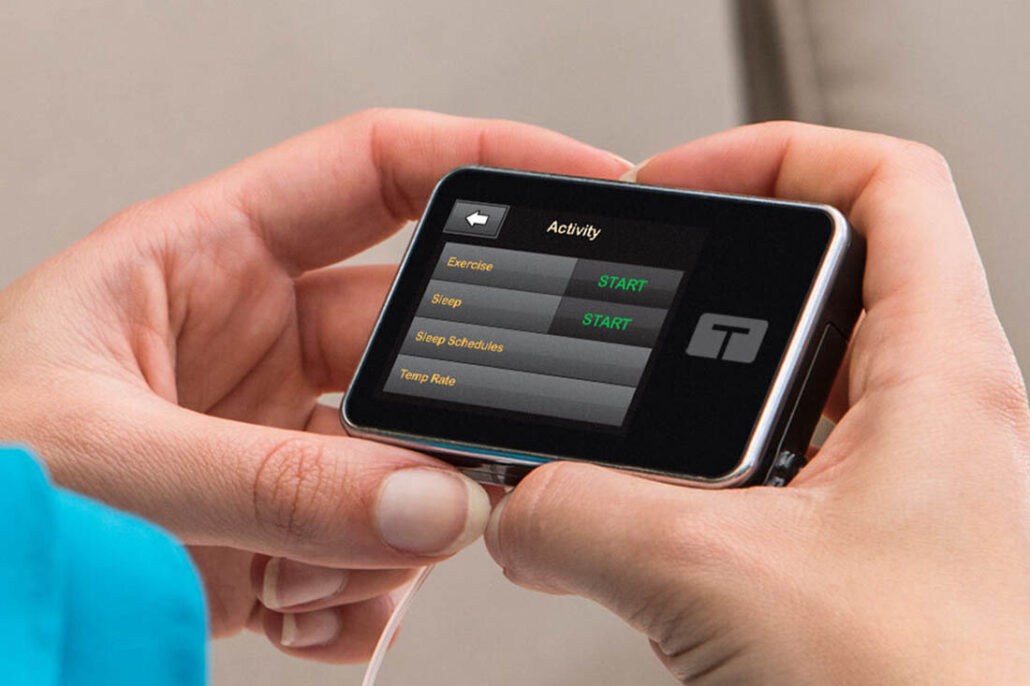 A person with diabetes using the exercise settings on their Tandem diabetes insulin pump