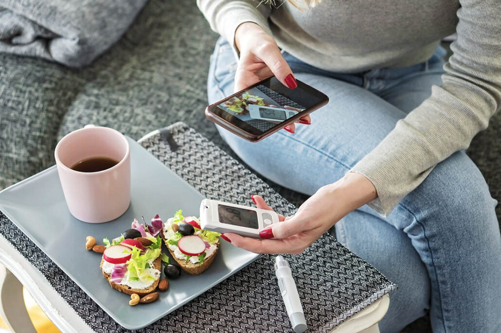 Woman with diabetes takes picture of her healthy snack to help with diabetes burnout