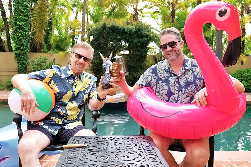 Two doctors with type 1 diabetes toast by the pool to a diabetes vacation