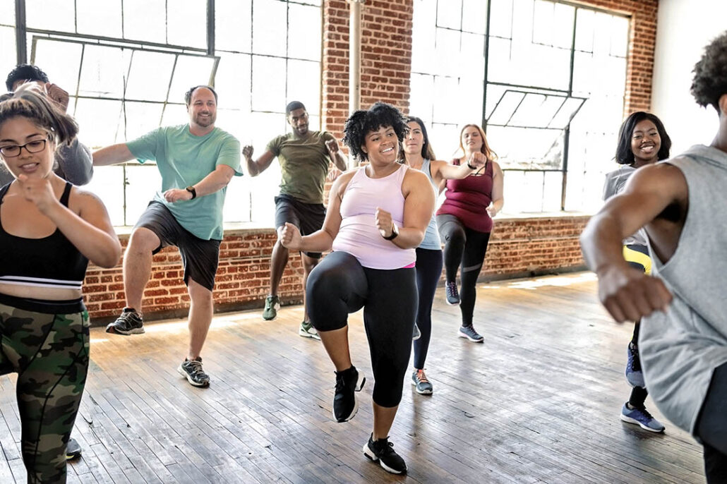 A group of people enjoying an active exercise class