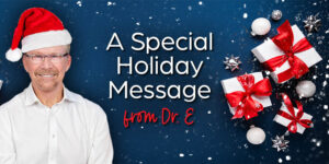 Dr. Edelman in a Santa hat with words of encouragement for the holiday season